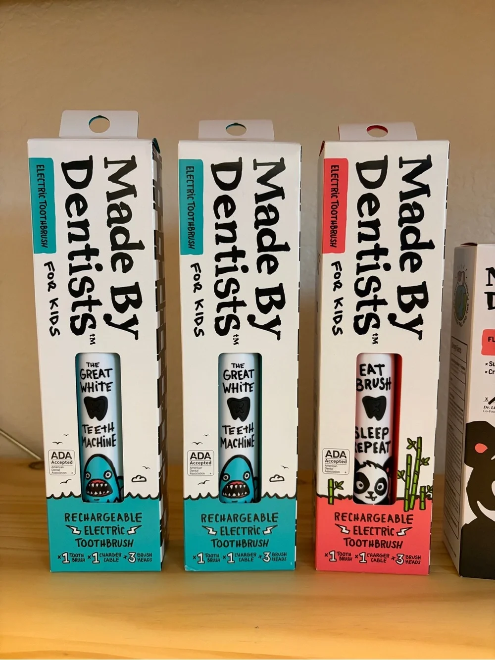 Made By Dentists Kids Toothpaste & Toothbrushes - Blue, Teal, Red, Black